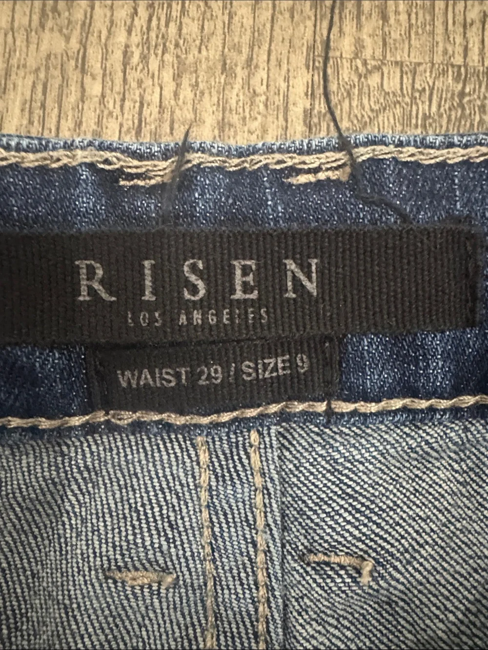 High-Rise Blue Flared Jeans with Raw Hem - Picture 2 of 5